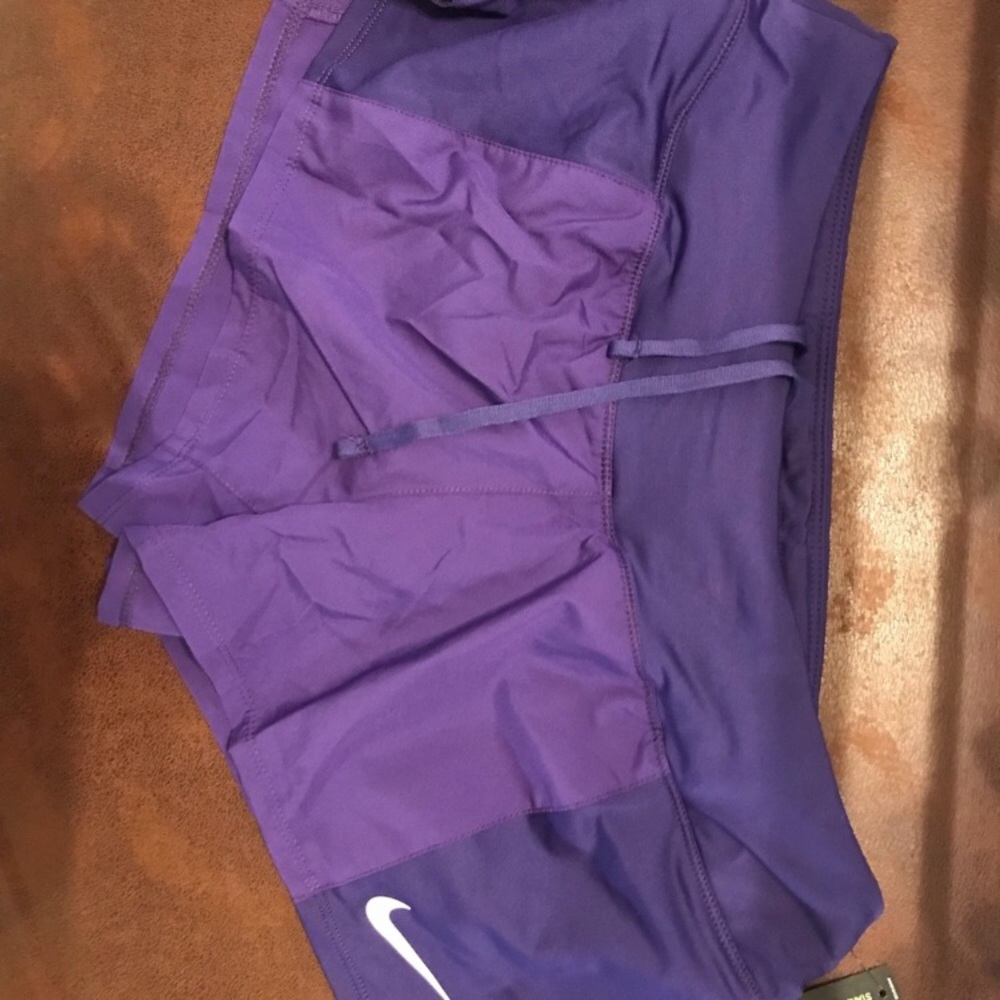 Purple Nike Dri-fit running shorts